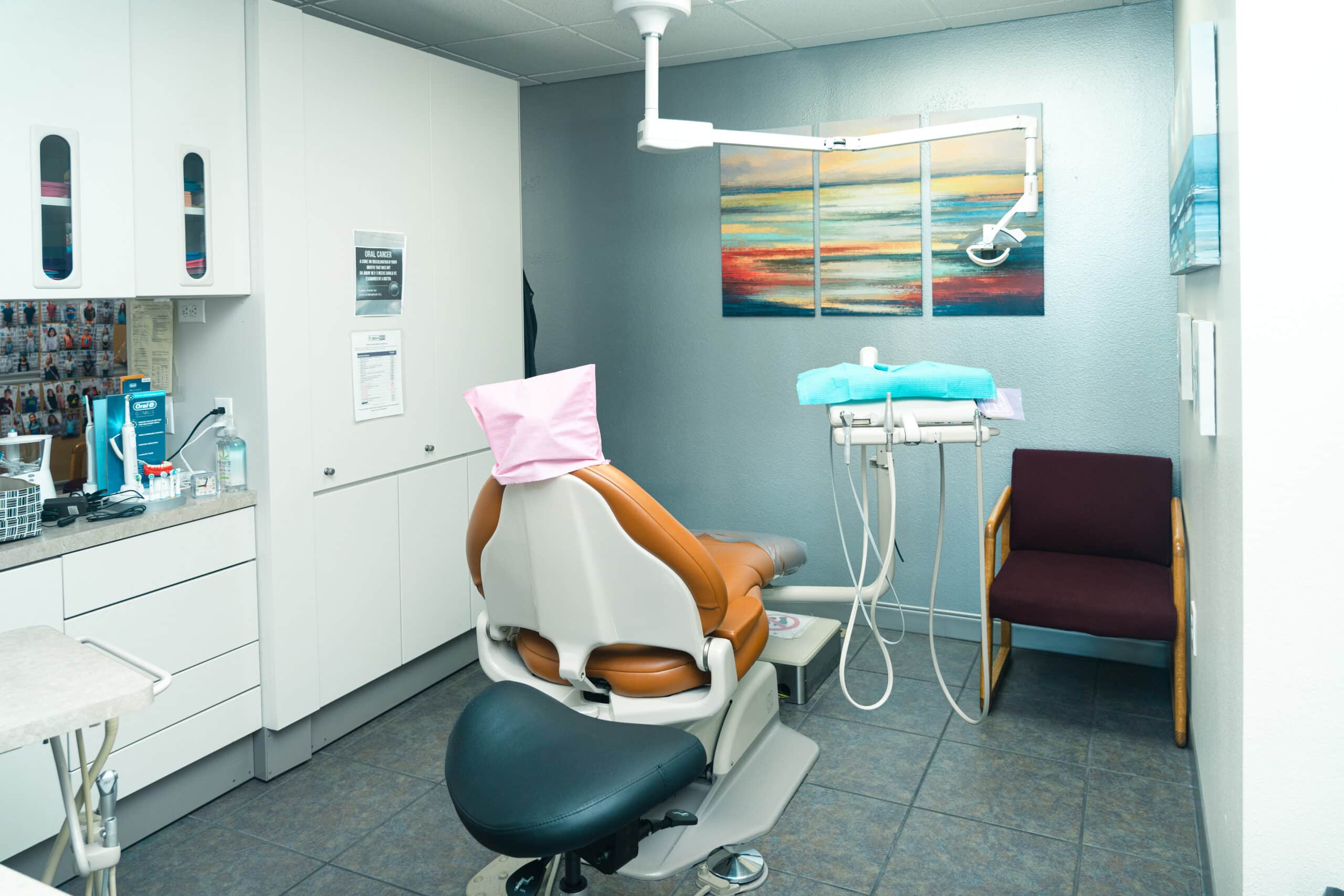 Modern dental chair facing wall art - Cosmetic Dentistry in Littleton, CO